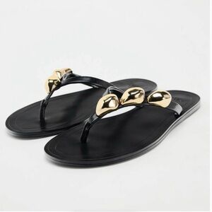 Elegant Black Sandals with Gold Accents